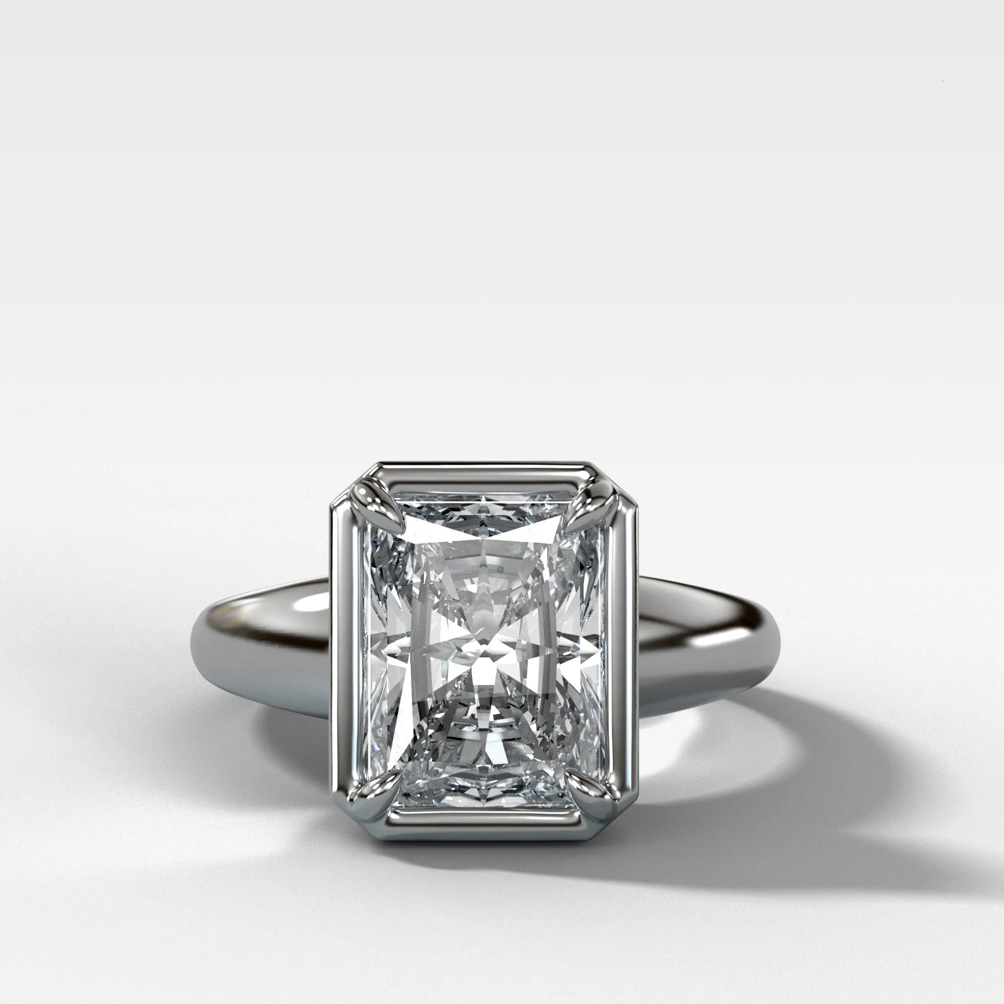 Club Ring Solitaire Engagement Ring With an Elongated Radiant Cut Diamond